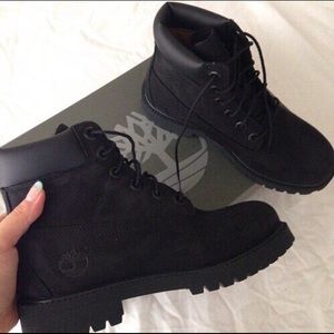 Women’s black on black Timberland Boots